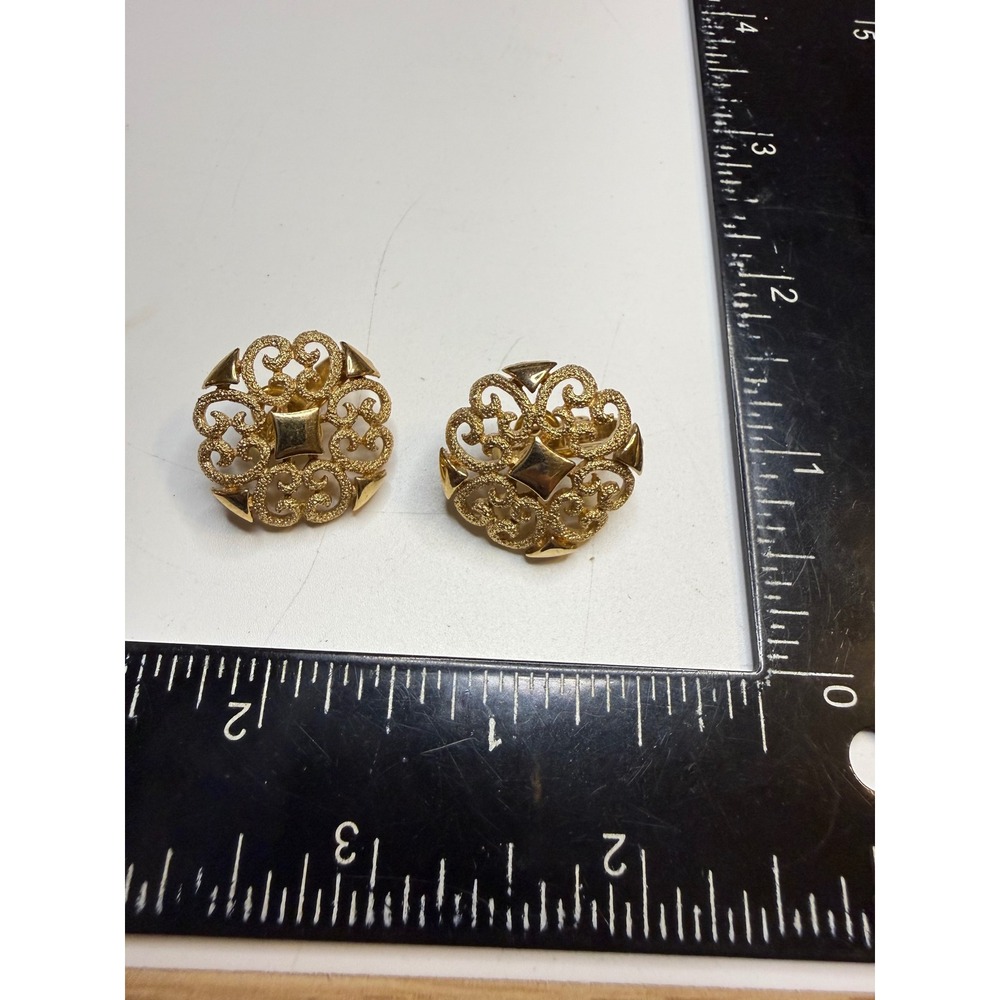Avon Gold Tone Filigree Clip On Earrings Round Textured Openwork Scroll Design